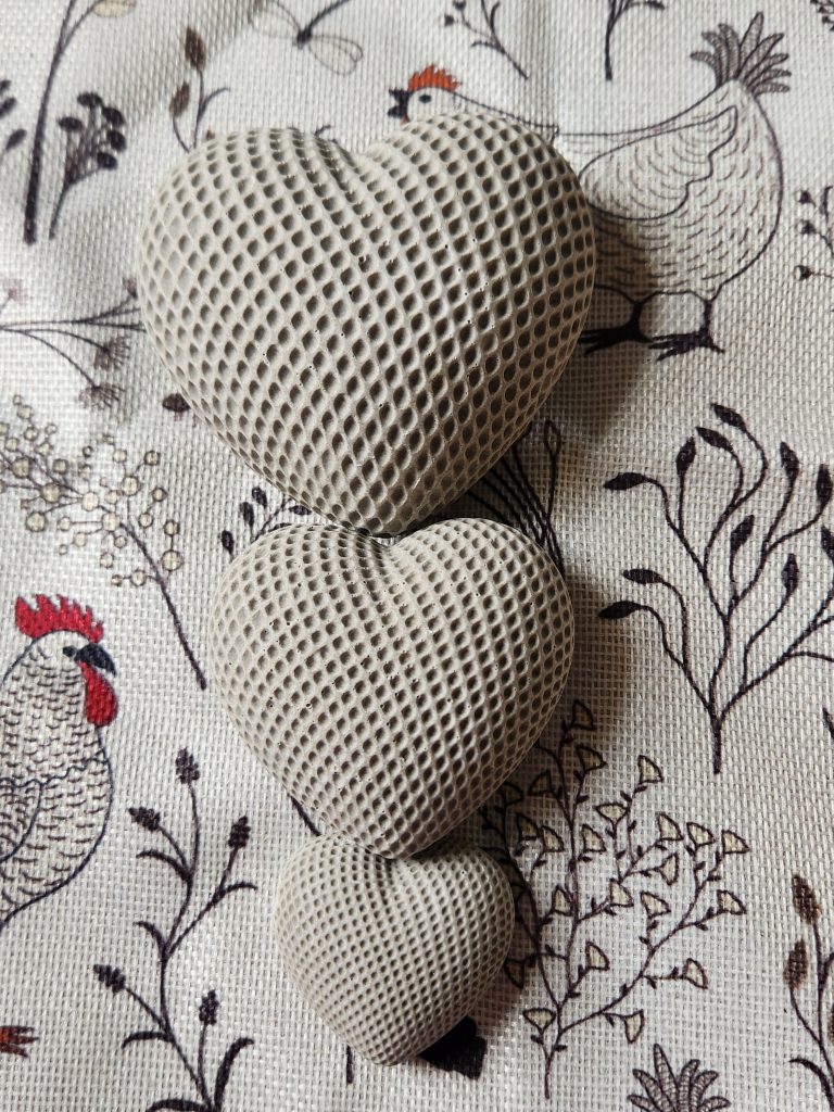 Hand cast stacked hearts